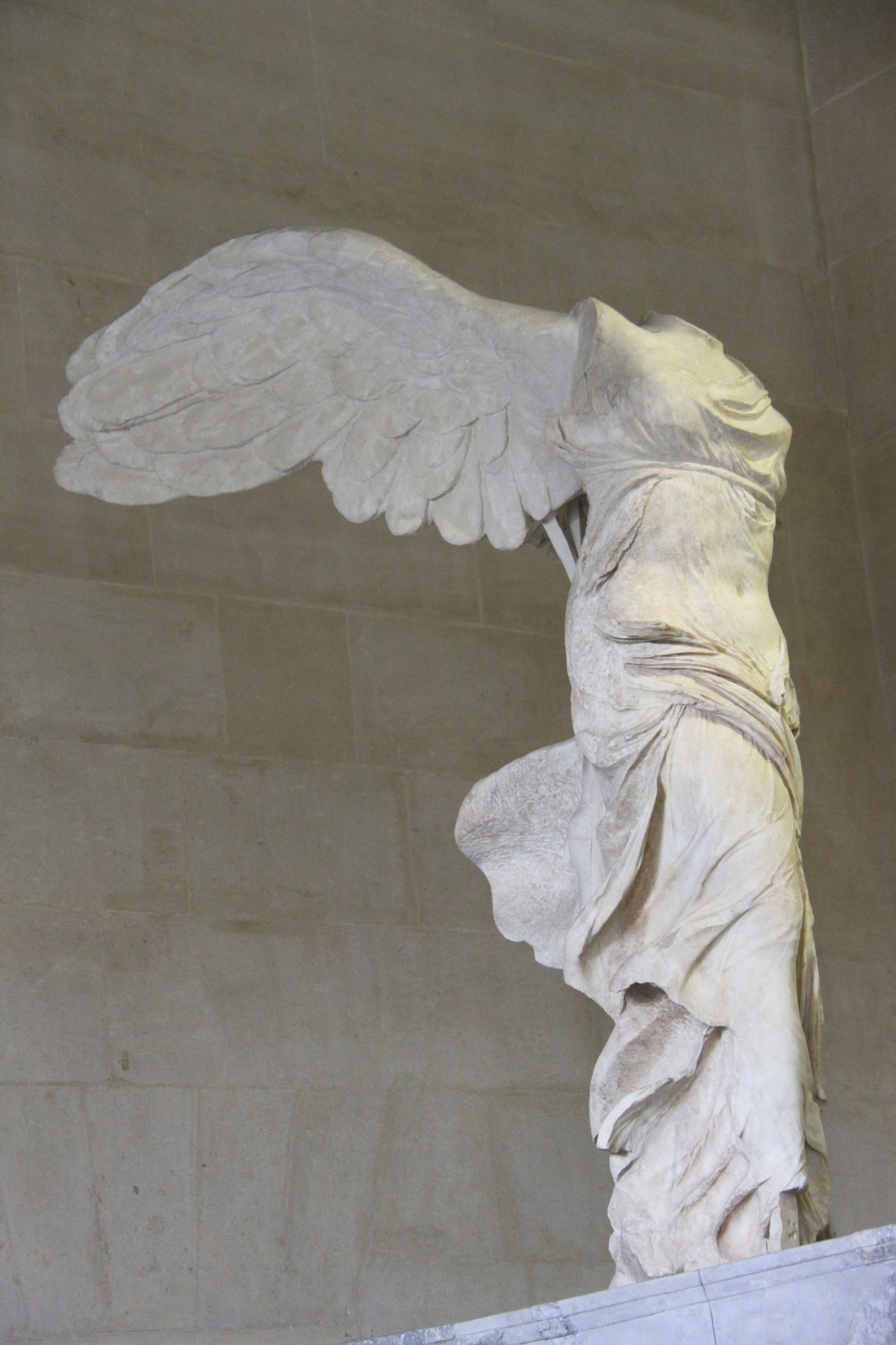 a statue of a headless angel